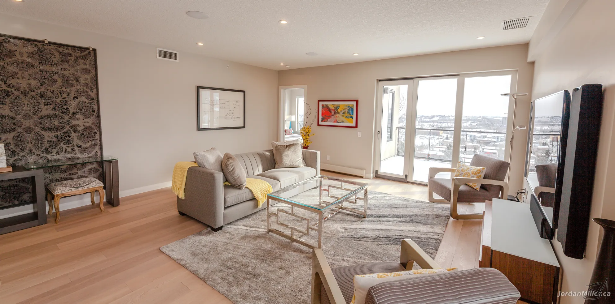 Living room facing private balcony