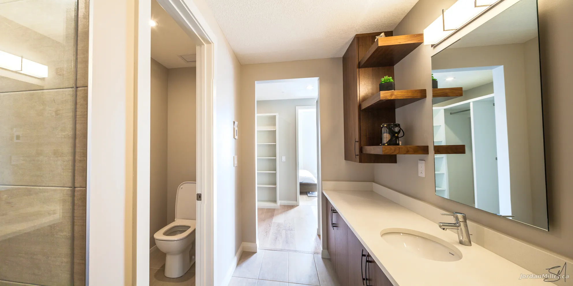 Master bathroom facing walk-in closet